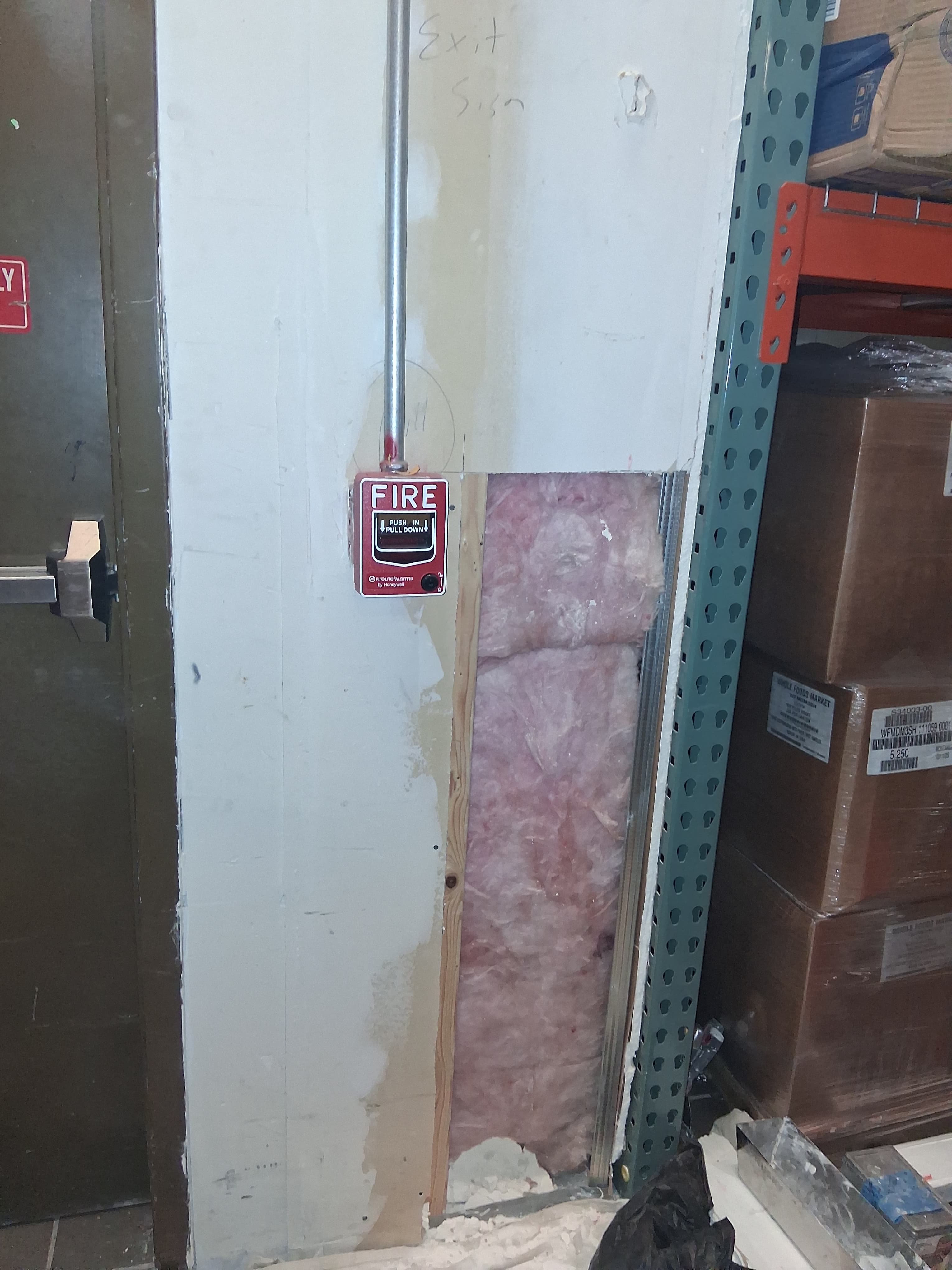 Commercial drywall damage before repair