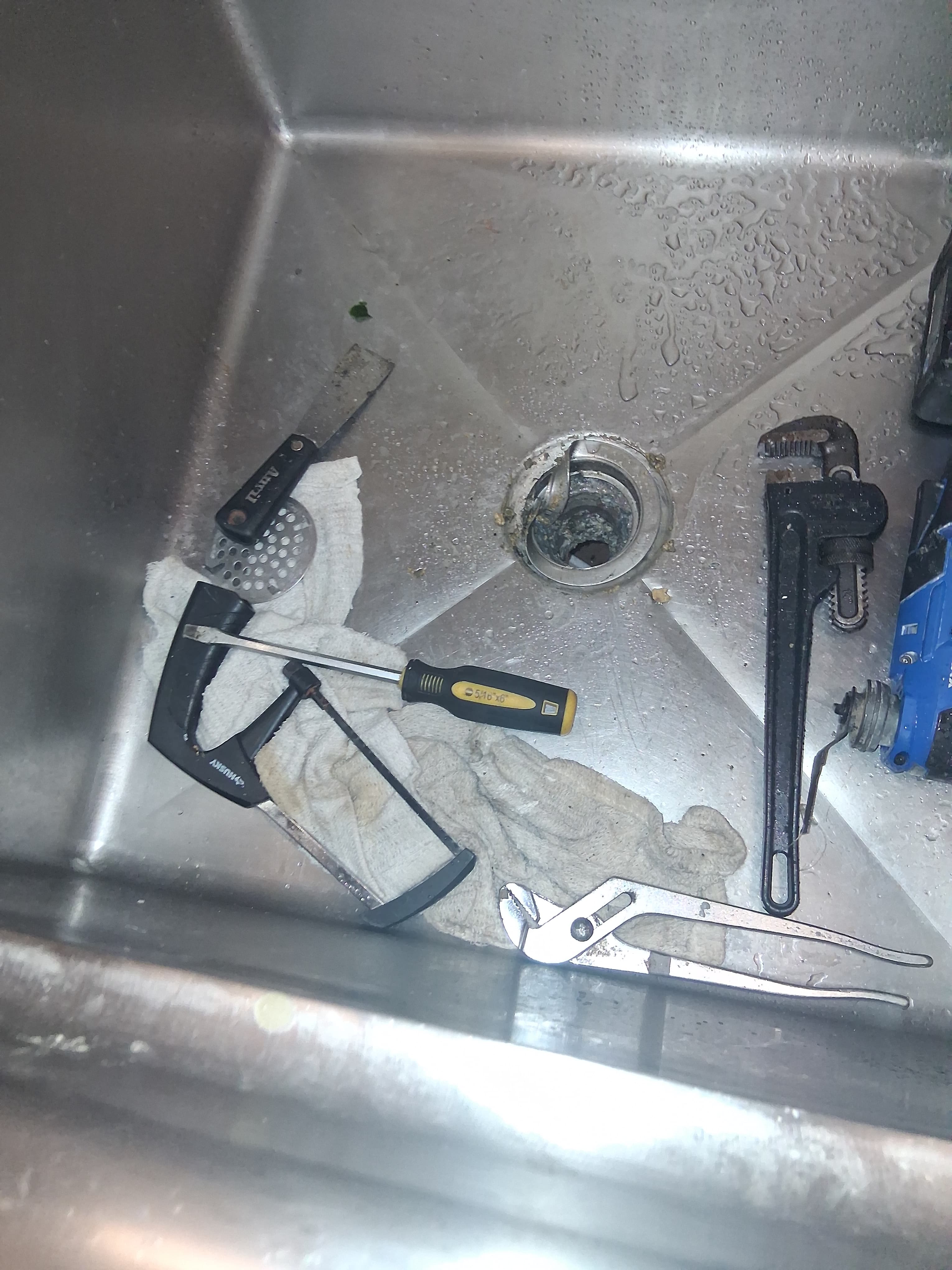 Commercial commercial kitchen sink drain during replacement