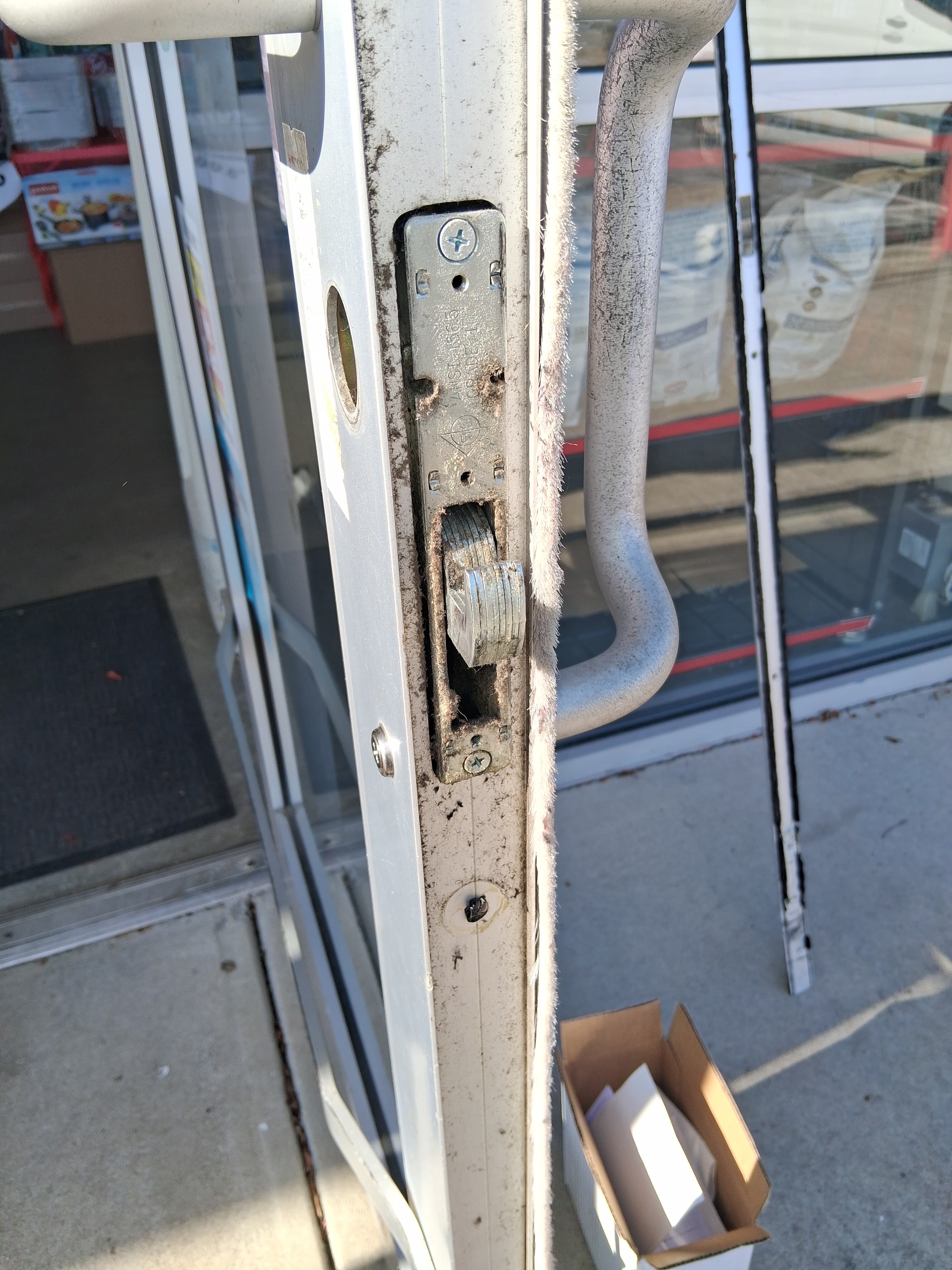 During replacement store front lockset
