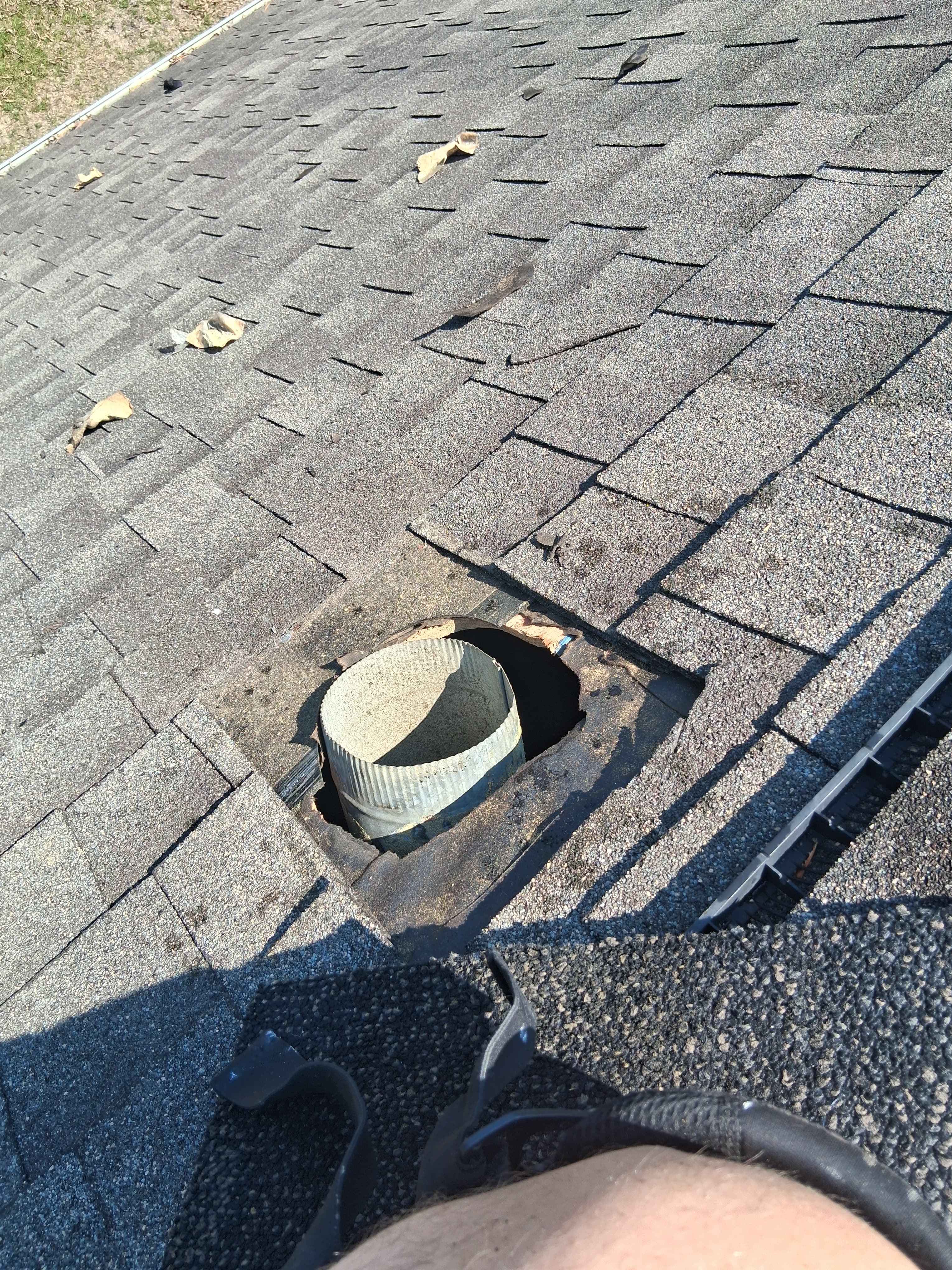 Residential roof vent before repair